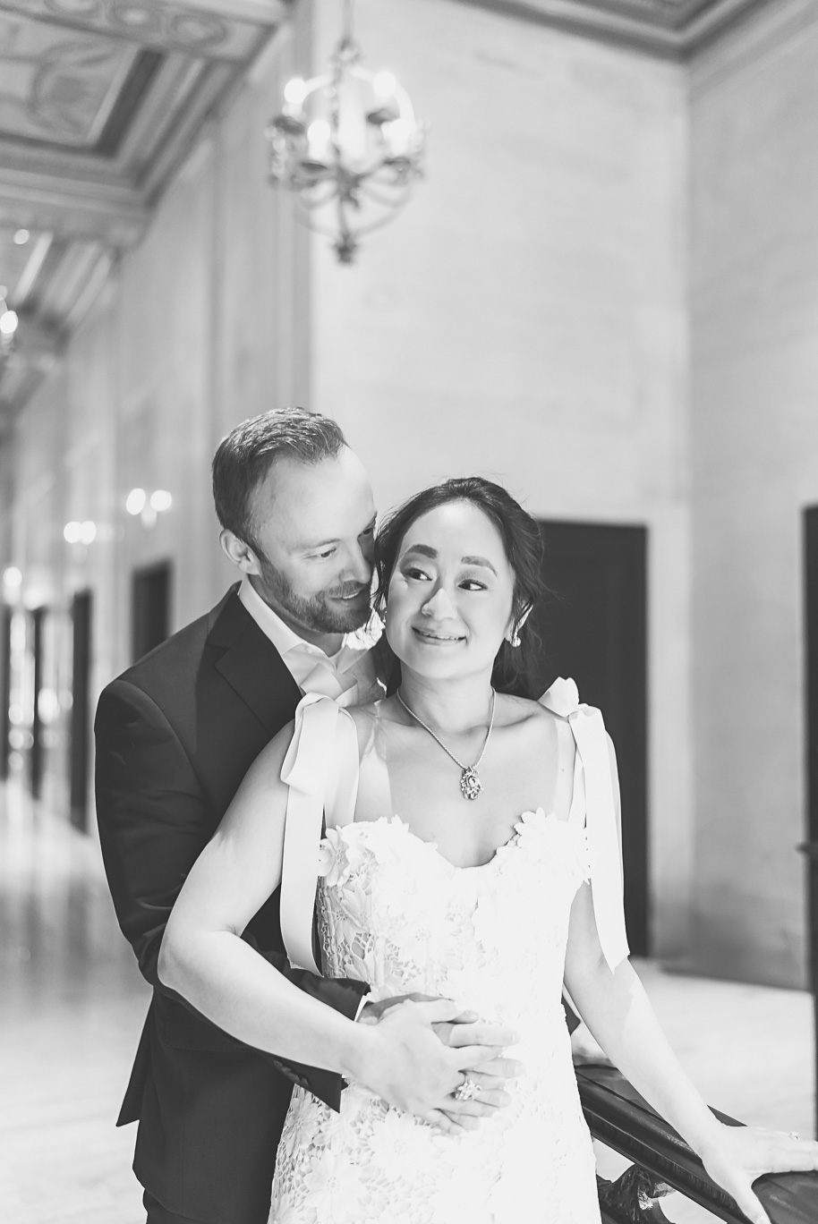 Book Tower engagement photos in Detroit by top-rated Detroit Wedding Photographers Kari Dawson + Co
