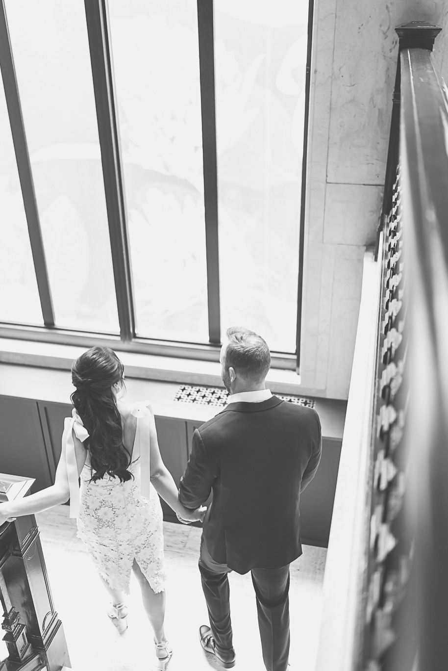 Book Tower engagement photos in Detroit by top-rated Detroit Wedding Photographers Kari Dawson + Co
