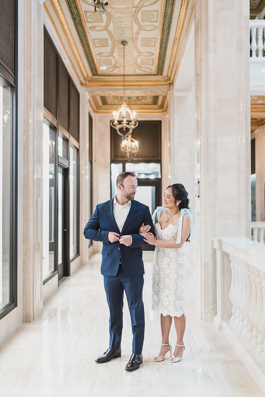 Book Tower engagement photos in Detroit by top-rated Detroit Wedding Photographers Kari Dawson + Co

