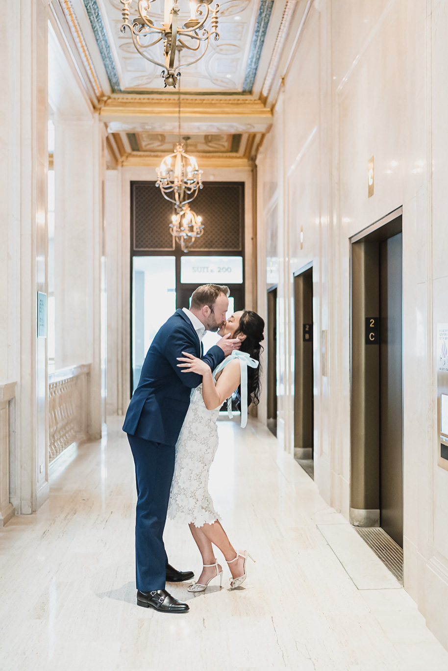 Book Tower engagement photos in Detroit by top-rated Detroit Wedding Photographers Kari Dawson + Co
