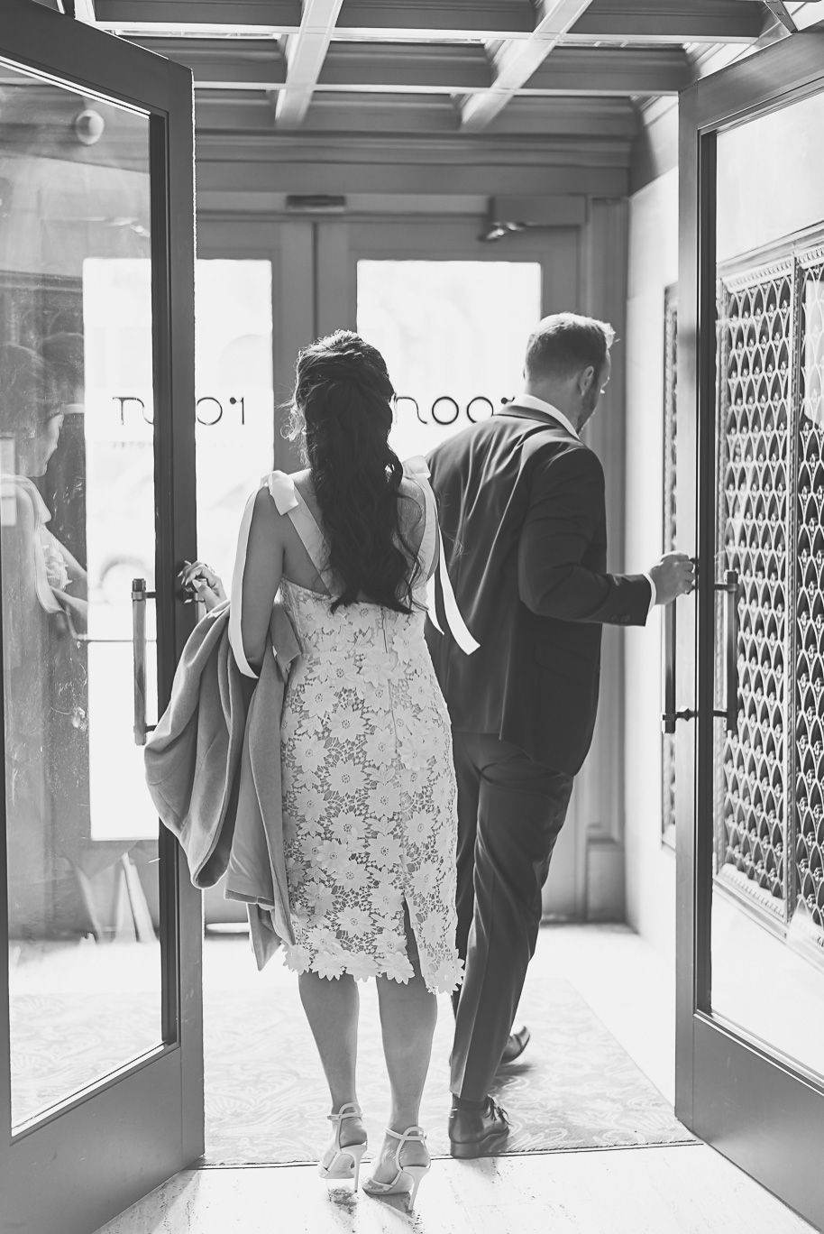 Book Tower engagement photos in Detroit by top-rated Detroit Wedding Photographers Kari Dawson + Co
