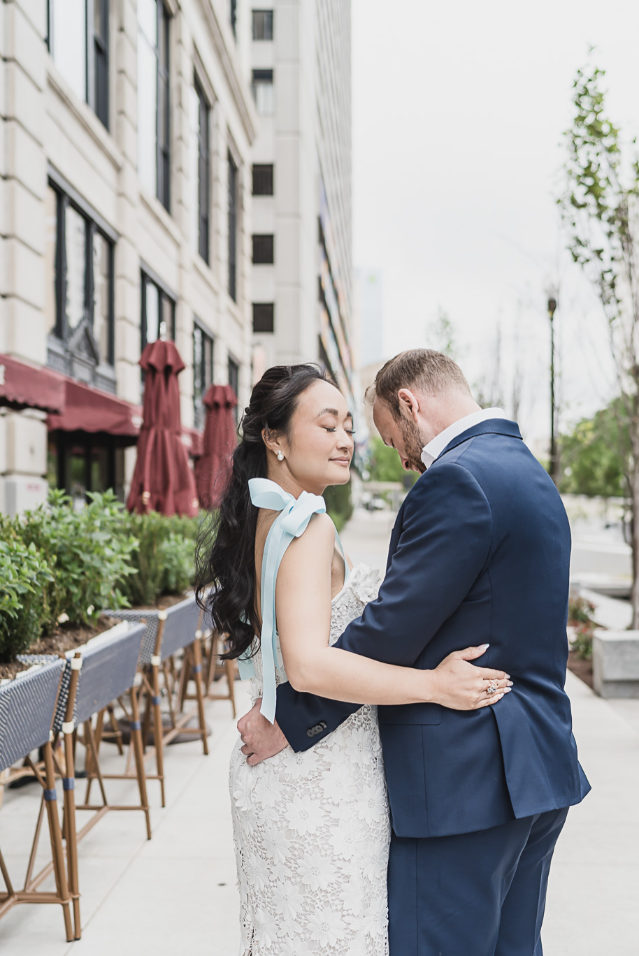 Book Tower engagement photos in Detroit by top-rated Detroit Wedding Photographers Kari Dawson + Co
