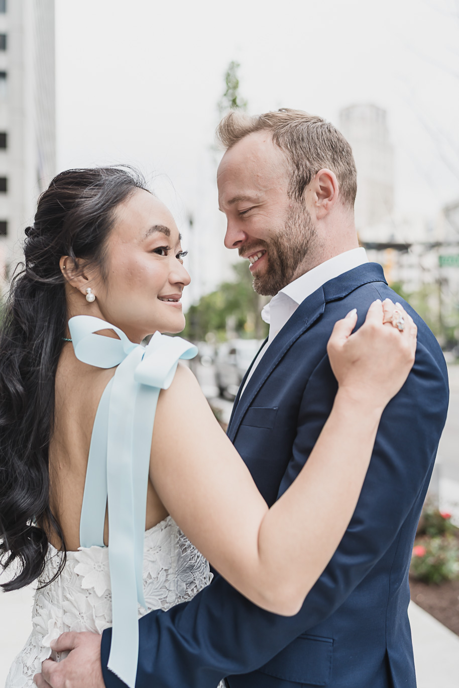 Book Tower engagement photos in Detroit by top-rated Detroit Wedding Photographers Kari Dawson + Co
