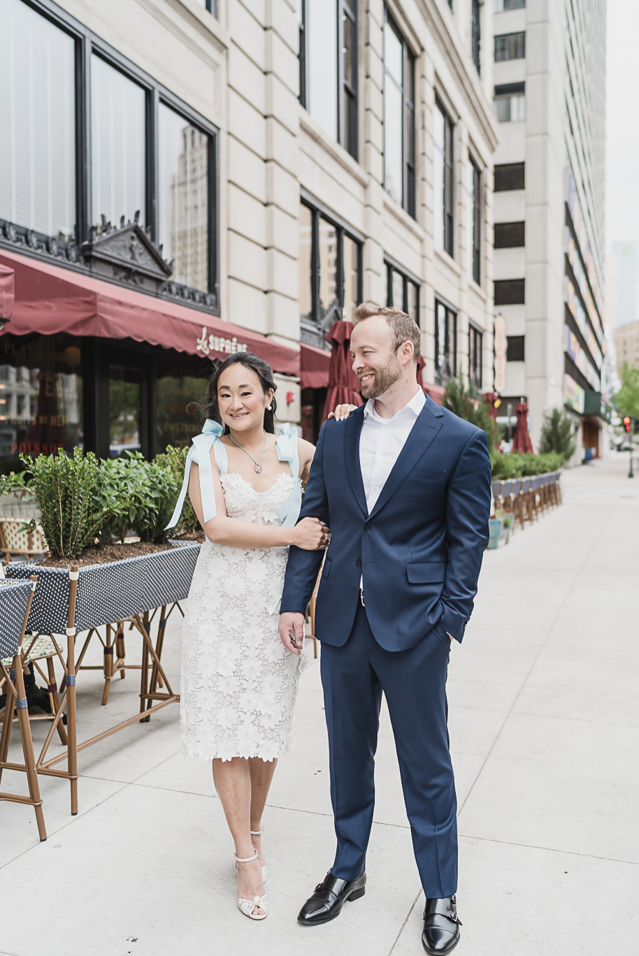 Book Tower engagement photos in Detroit by top-rated Detroit Wedding Photographers Kari Dawson + Co
