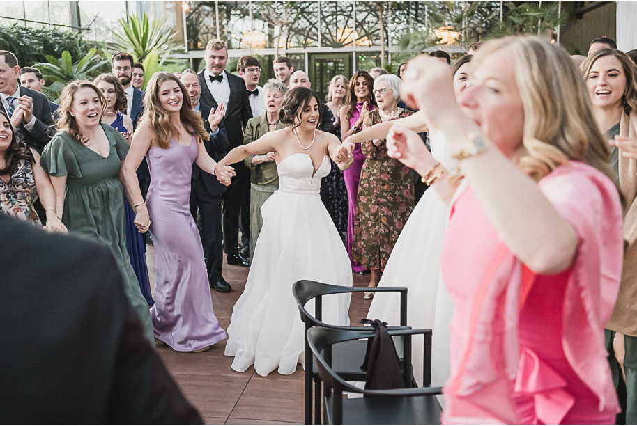 A summer black tie lush Planterra Conservatory Wedding same sex in West Bloomfield Michigan by Kari Dawson.