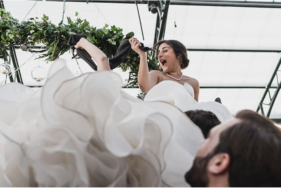 A summer black tie lush Planterra Conservatory Wedding same sex in West Bloomfield Michigan by Kari Dawson.
