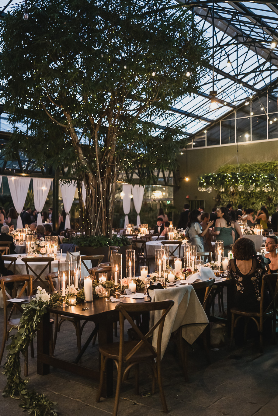 A summer black tie lush Planterra Conservatory Wedding same sex in West Bloomfield Michigan by Kari Dawson.