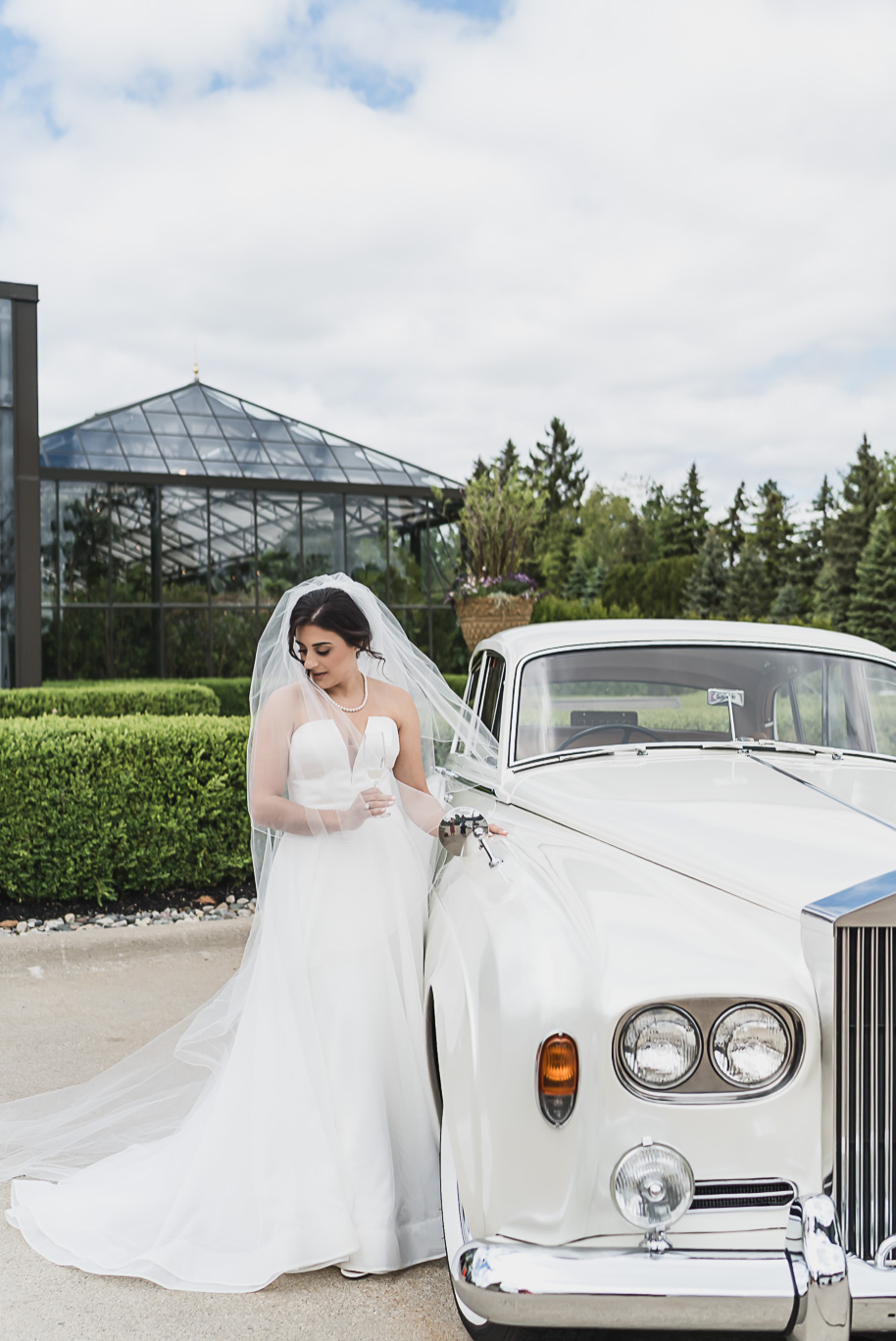 A summer black tie lush Planterra Conservatory Wedding same sex in West Bloomfield Michigan by Kari Dawson.