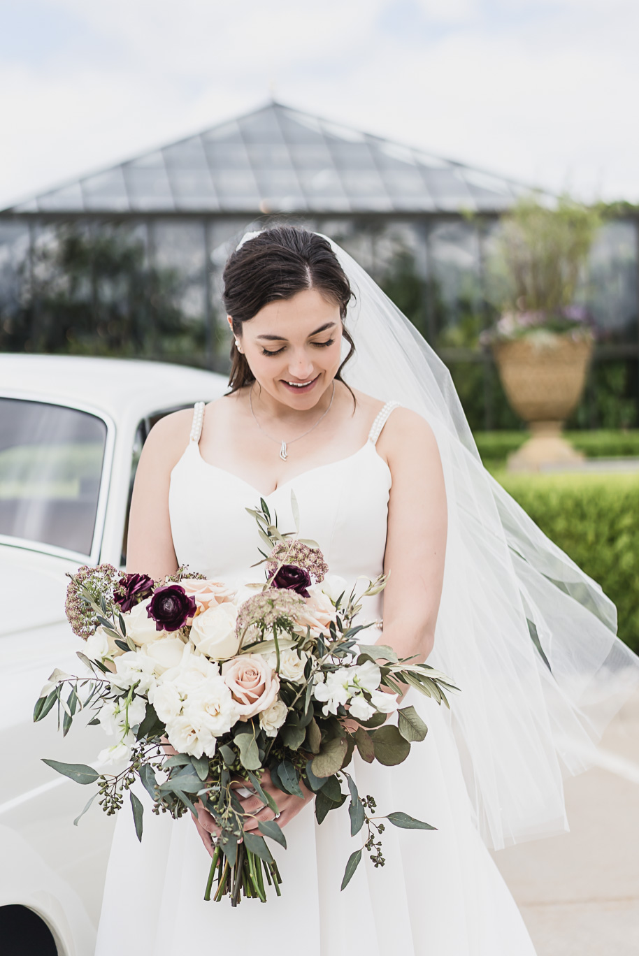 A summer black tie lush Planterra Conservatory Wedding same sex in West Bloomfield Michigan by Kari Dawson.