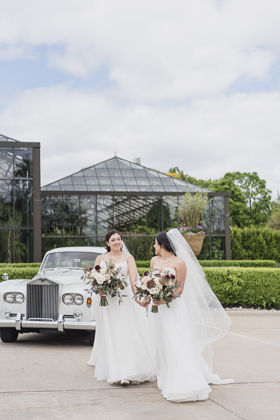 A summer black tie lush Planterra Conservatory Wedding same sex in West Bloomfield Michigan by Kari Dawson.