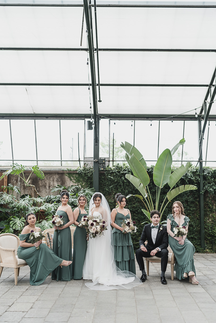 A summer black tie lush Planterra Conservatory Wedding same sex in West Bloomfield Michigan by Kari Dawson.