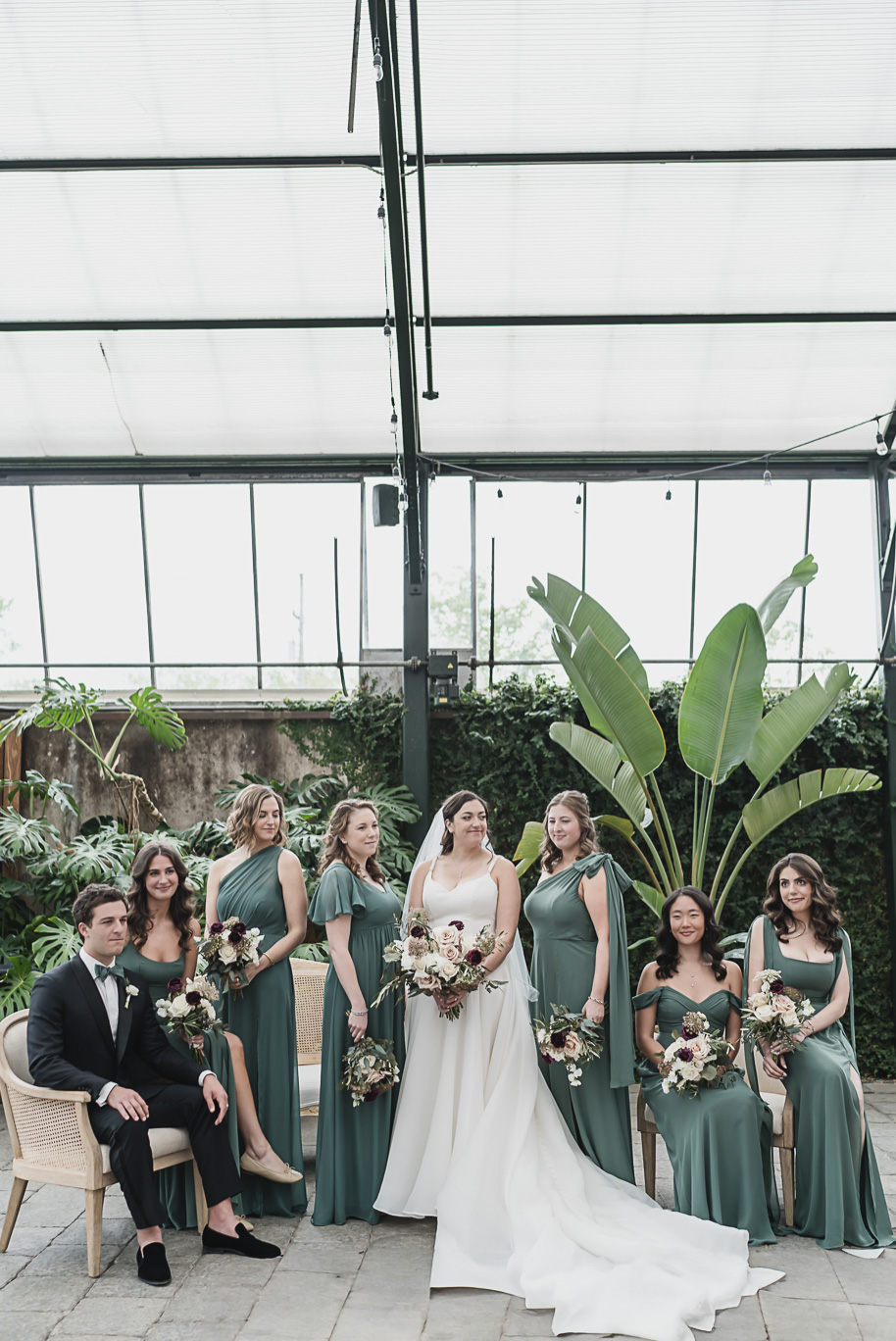 A summer black tie lush Planterra Conservatory Wedding same sex in West Bloomfield Michigan by Kari Dawson.