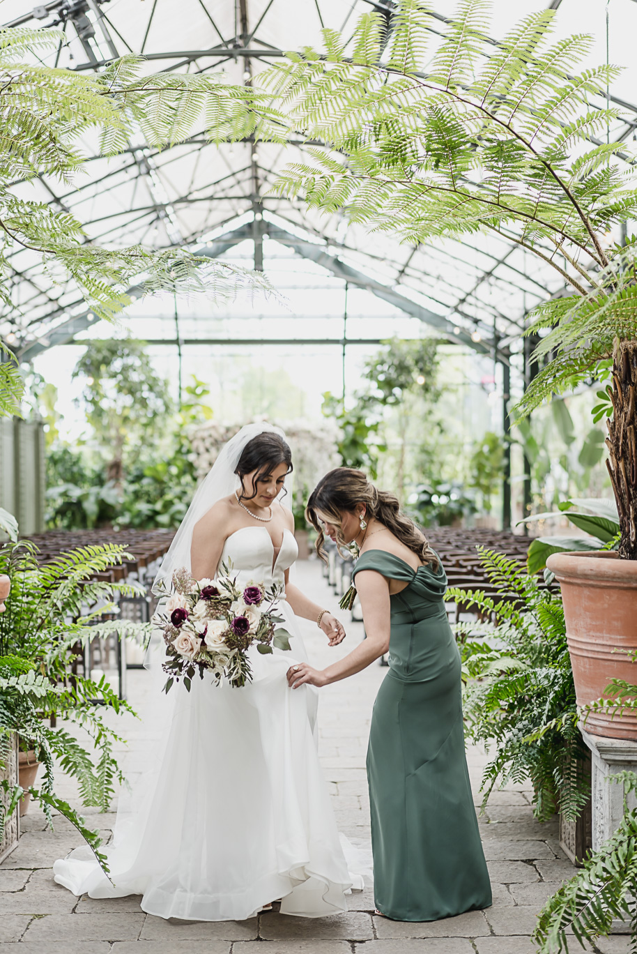 A summer black tie lush Planterra Conservatory Wedding same sex in West Bloomfield Michigan by Kari Dawson.