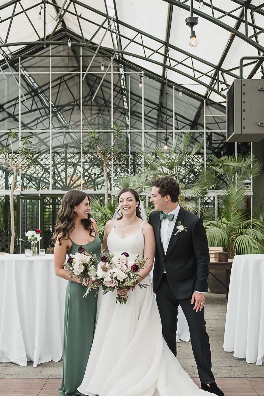 A summer black tie lush Planterra Conservatory Wedding same sex in West Bloomfield Michigan by Kari Dawson.