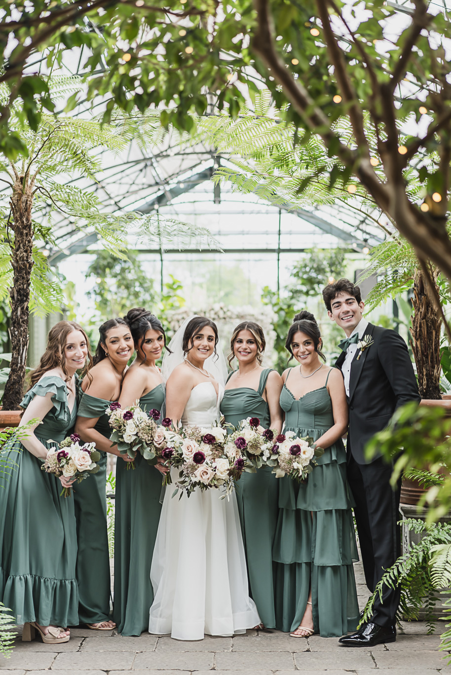 A summer black tie lush Planterra Conservatory Wedding same sex in West Bloomfield Michigan by Kari Dawson.
