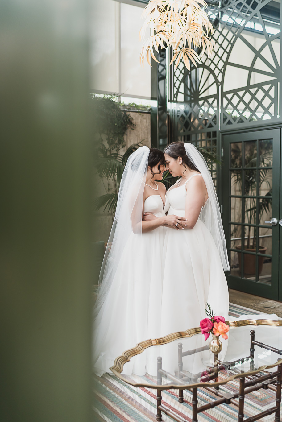 A summer black tie lush Planterra Conservatory Wedding same sex in West Bloomfield Michigan by Kari Dawson.