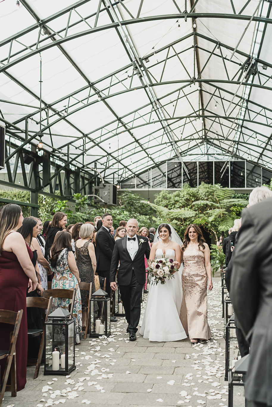 A summer black tie lush Planterra Conservatory Wedding same sex in West Bloomfield Michigan by Kari Dawson.