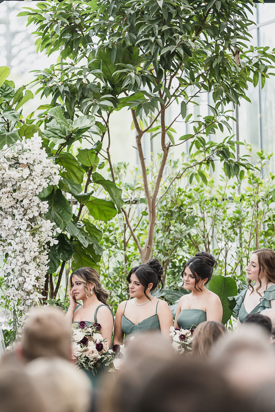 A summer black tie lush Planterra Conservatory Wedding same sex in West Bloomfield Michigan by Kari Dawson.