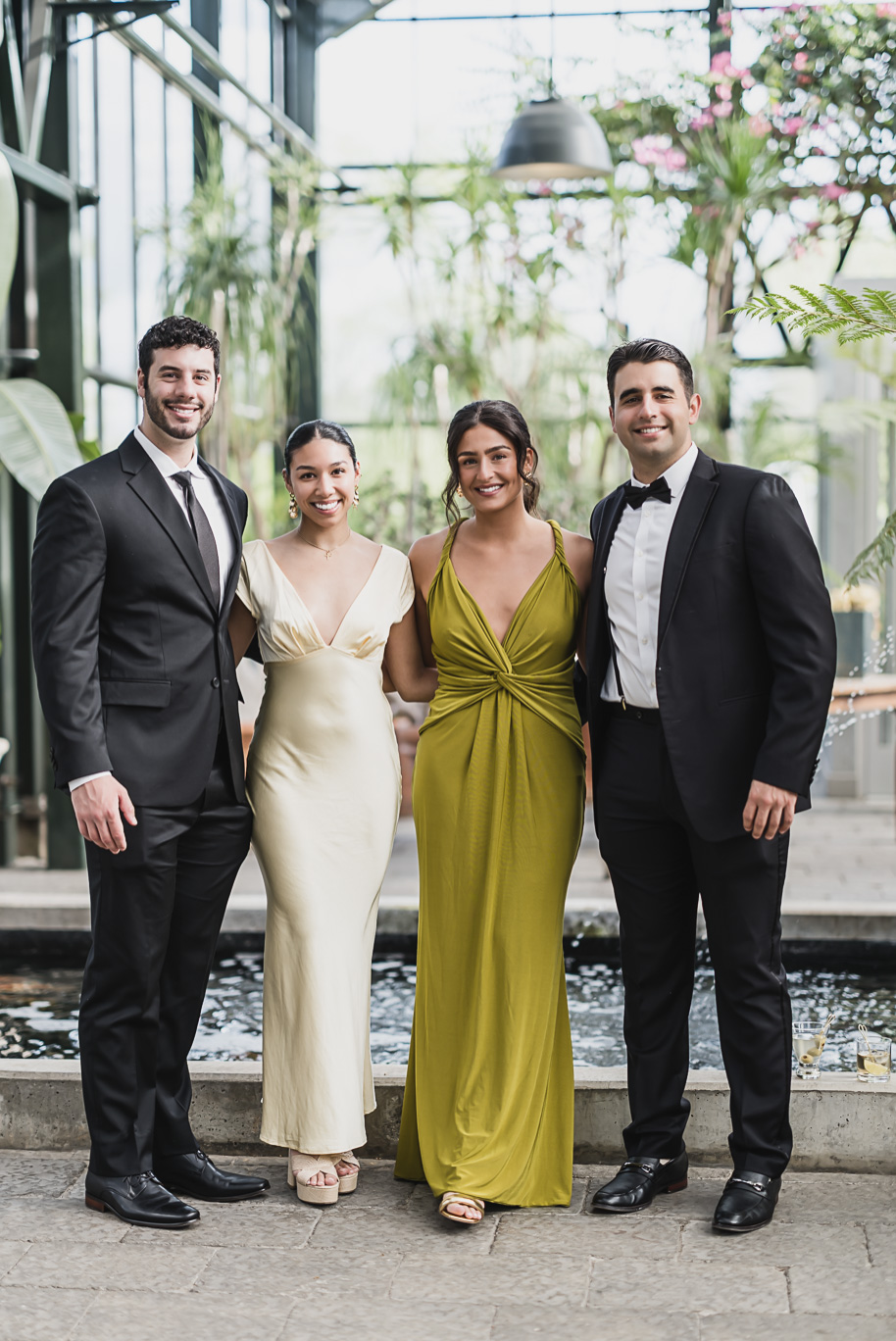A summer black tie lush Planterra Conservatory Wedding same sex in West Bloomfield Michigan by Kari Dawson.
