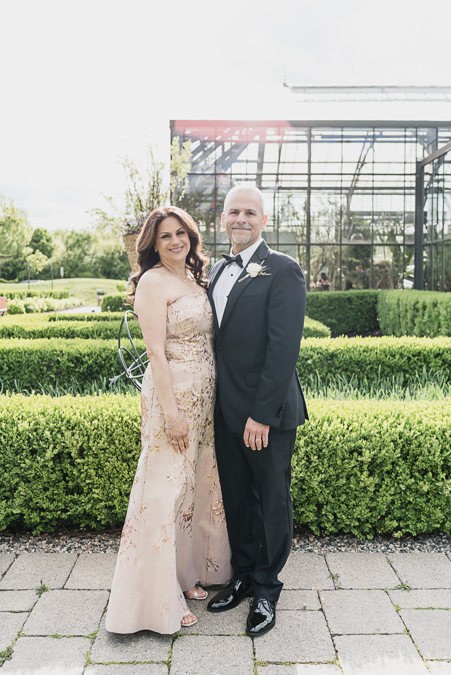 A summer black tie lush Planterra Conservatory Wedding same sex in West Bloomfield Michigan by Kari Dawson.