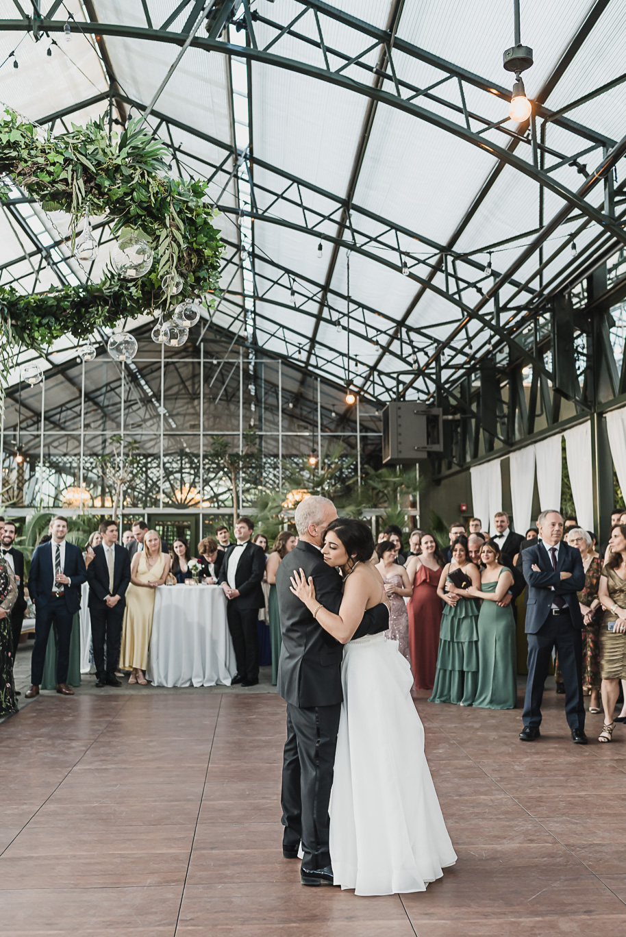 A summer black tie lush Planterra Conservatory Wedding same sex in West Bloomfield Michigan by Kari Dawson.