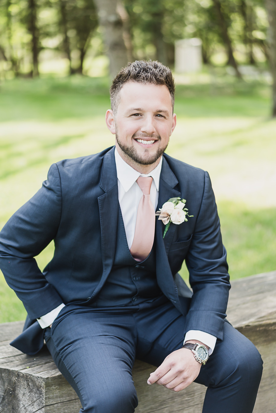 Dusty rose and navy wedding at Tobacco Ranch with sunset portraits and emotional ceremony