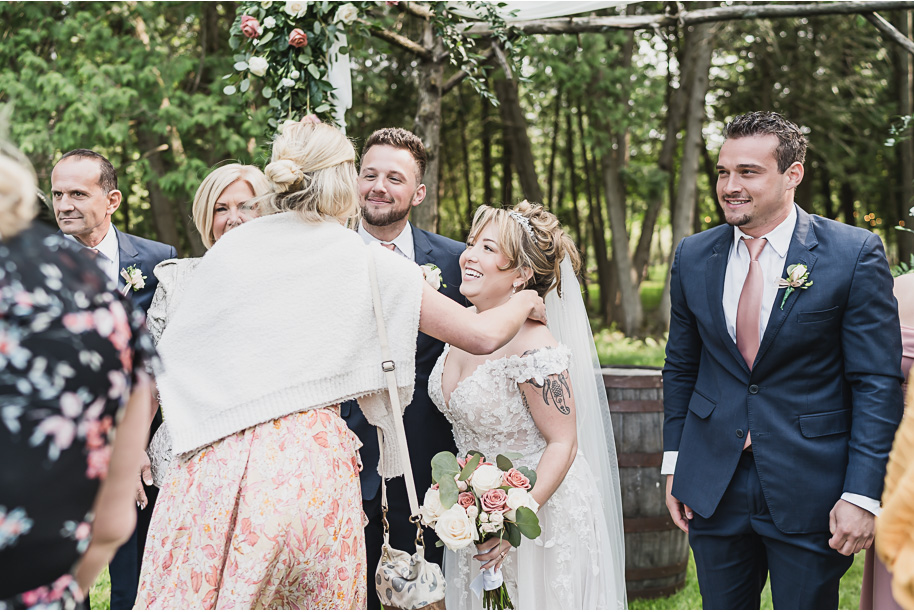 Dusty rose and navy wedding at Tobacco Ranch with sunset portraits and emotional ceremony