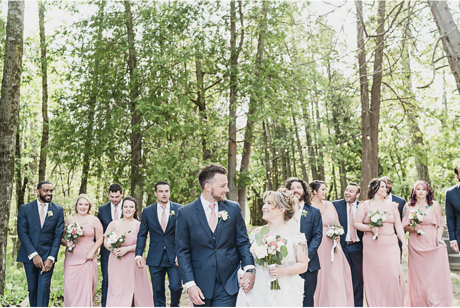 Dusty rose and navy wedding at Tobacco Ranch with sunset portraits and emotional ceremony