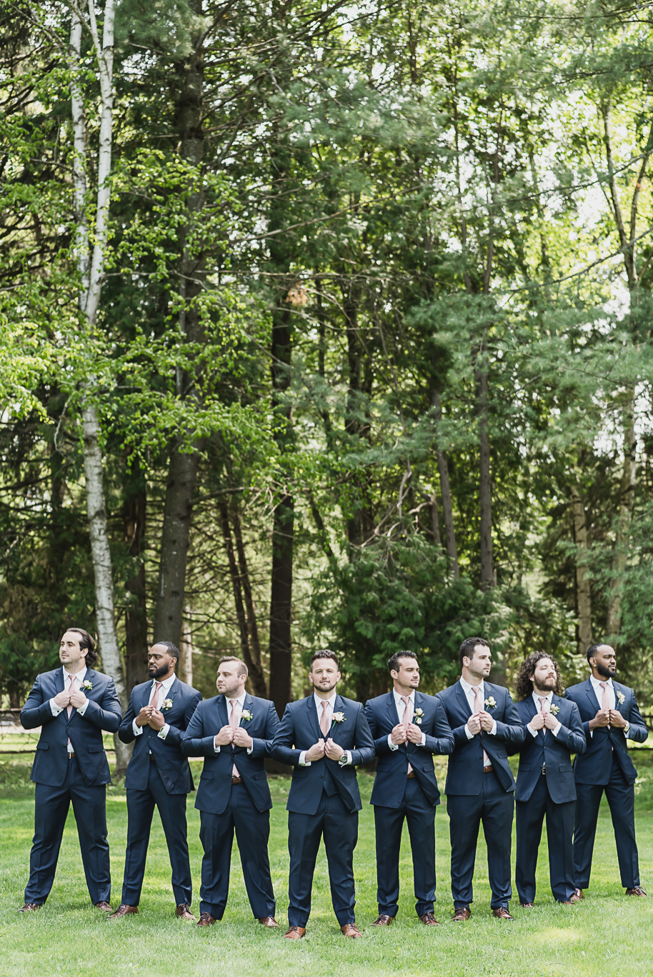 Dusty rose and navy wedding at Tobacco Ranch with sunset portraits and emotional ceremony