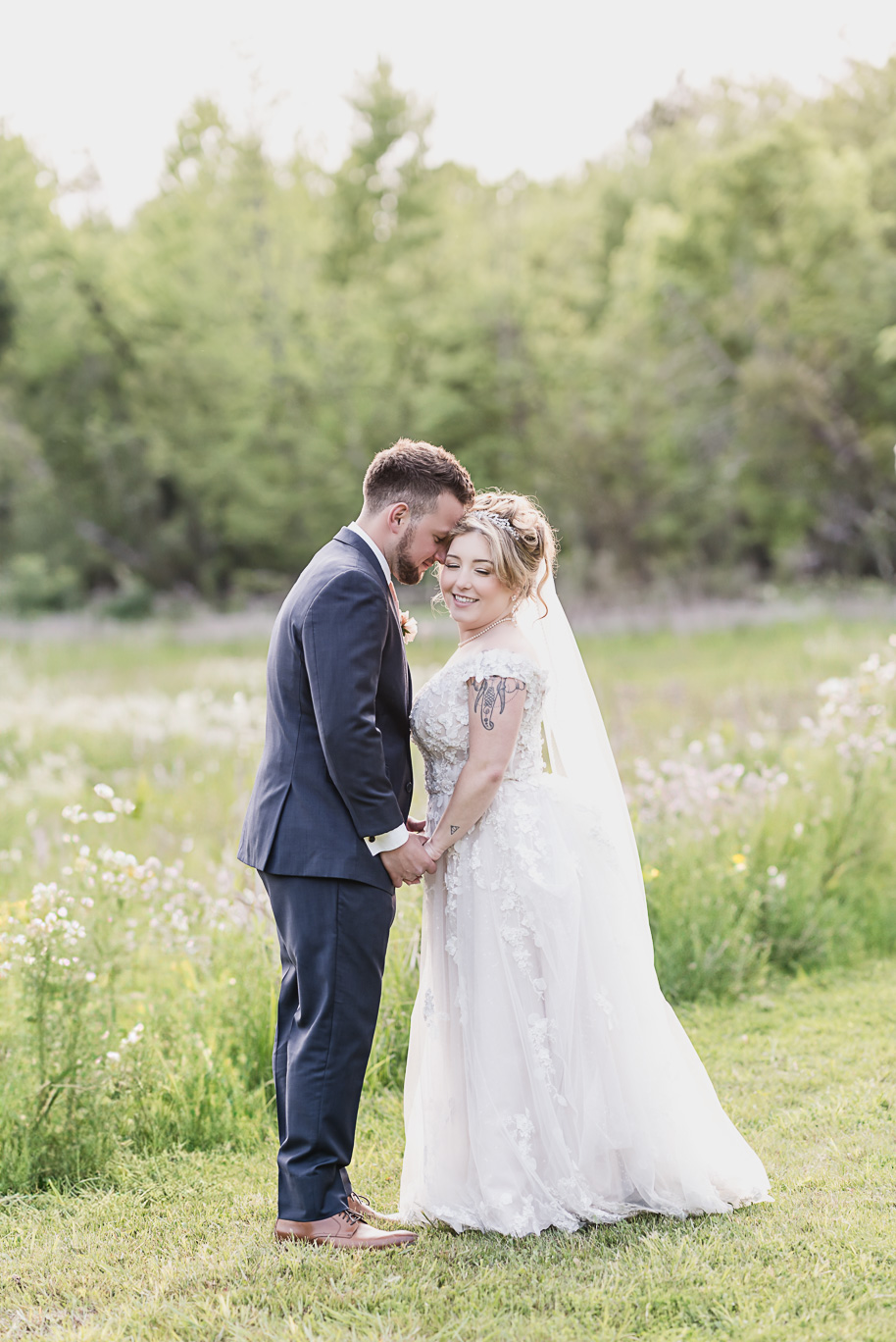 Dusty rose and navy wedding at Tobacco Ranch with sunset portraits and emotional ceremony