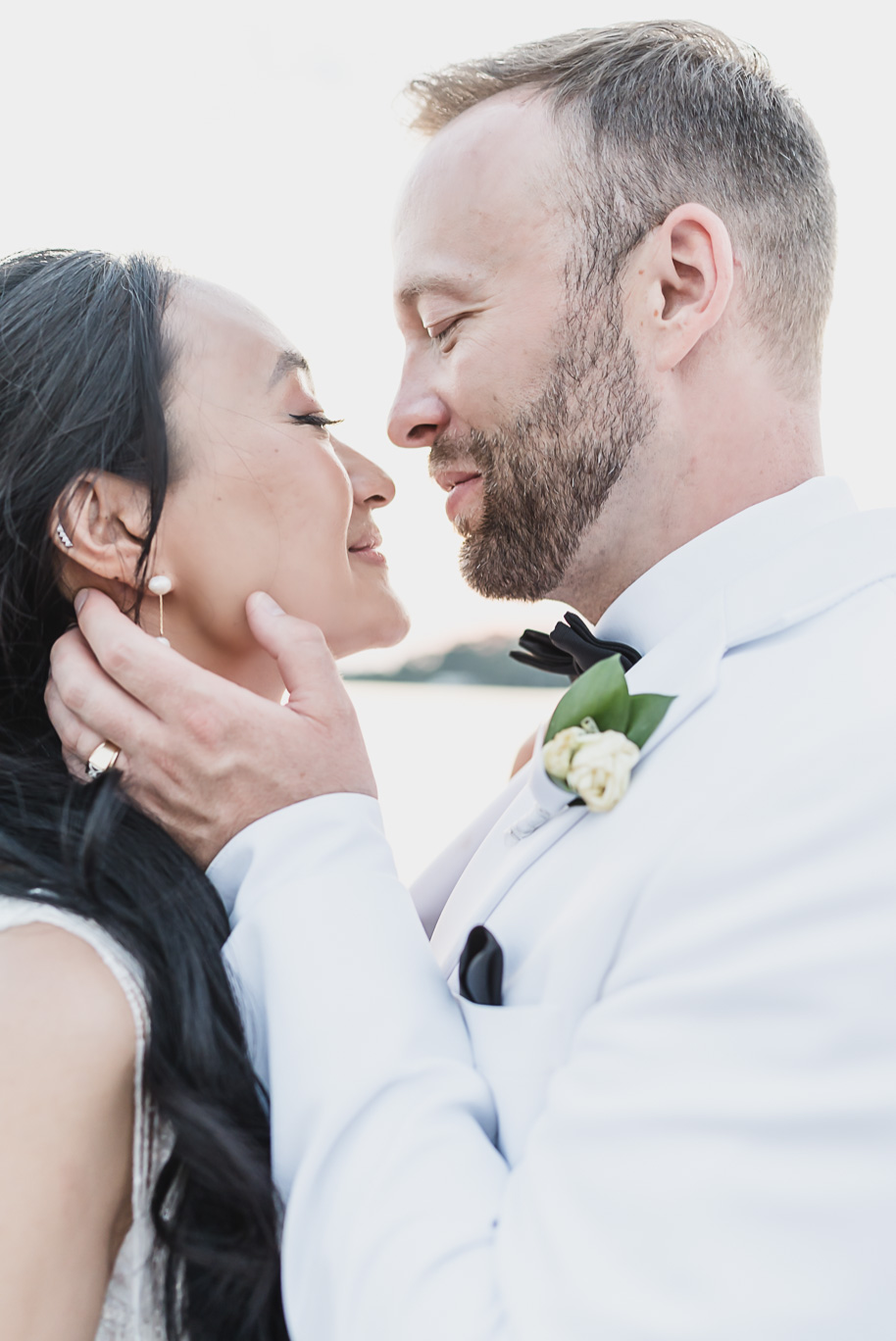 A classic black tie dusty blue and black Detroit Yacht Club wedding steeped in tradition, family heirlooms, hydrangaes, and happy tears by Kari Dawson, top rated Detroit wedding photographer, and her team. 