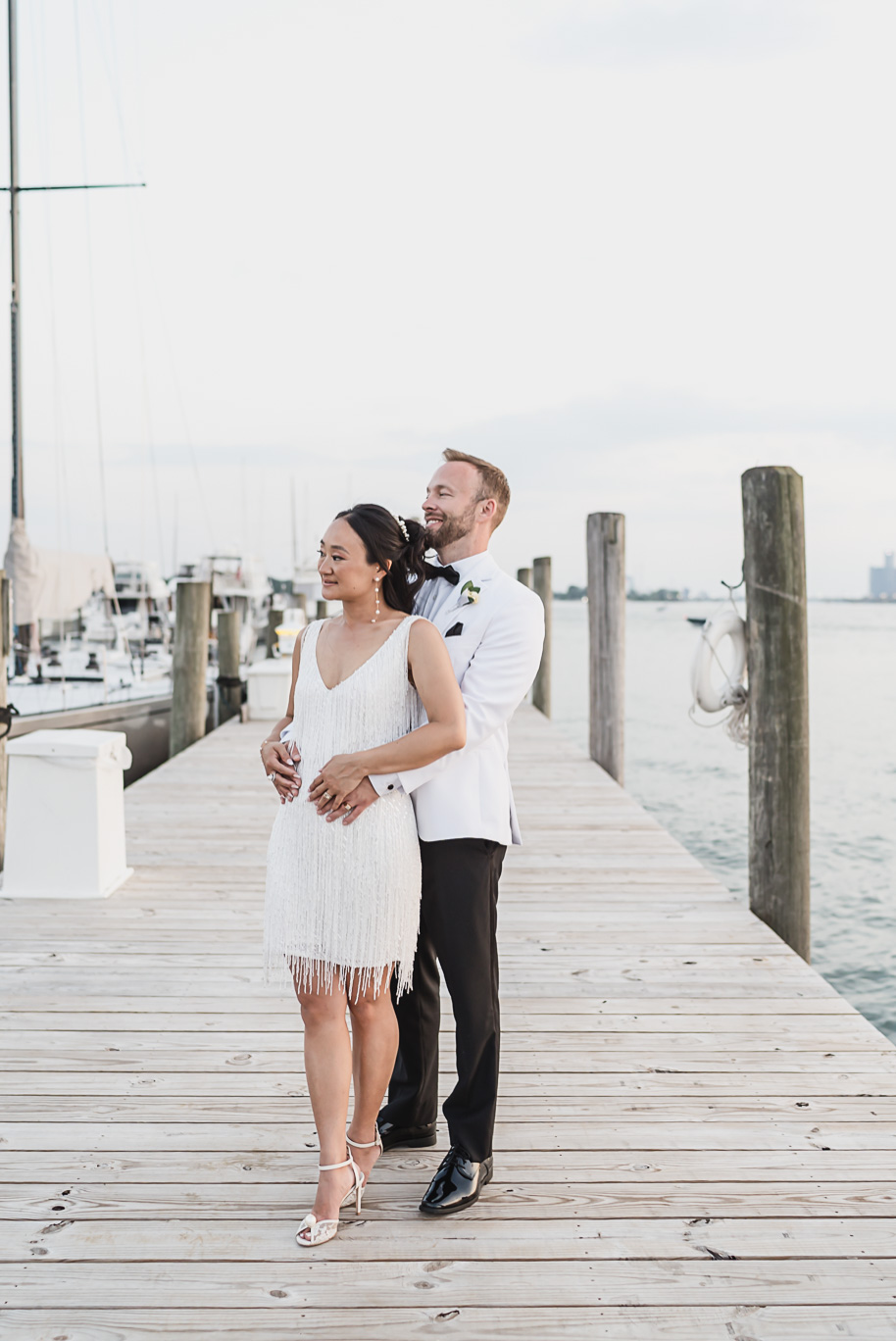 A classic black tie dusty blue and black Detroit Yacht Club wedding steeped in tradition, family heirlooms, hydrangaes, and happy tears by Kari Dawson, top rated Detroit wedding photographer, and her team. 