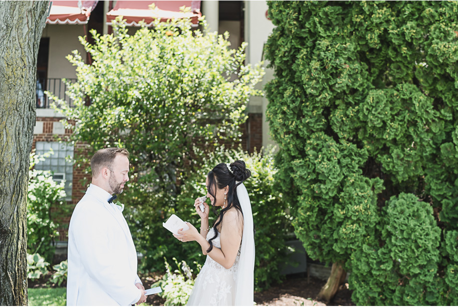 A classic black tie dusty blue and black Detroit Yacht Club wedding steeped in tradition, family heirlooms, hydrangaes, and happy tears by Kari Dawson, top rated Detroit wedding photographer, and her team. 