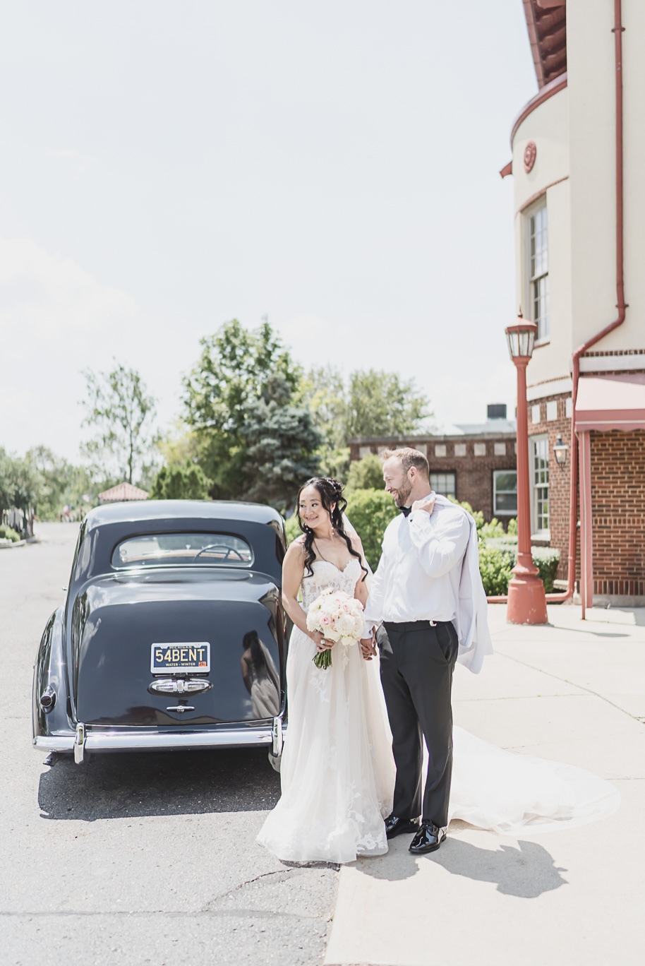 A classic black tie dusty blue and black Detroit Yacht Club wedding steeped in tradition, family heirlooms, hydrangaes, and happy tears by Kari Dawson, top rated Detroit wedding photographer, and her team. 