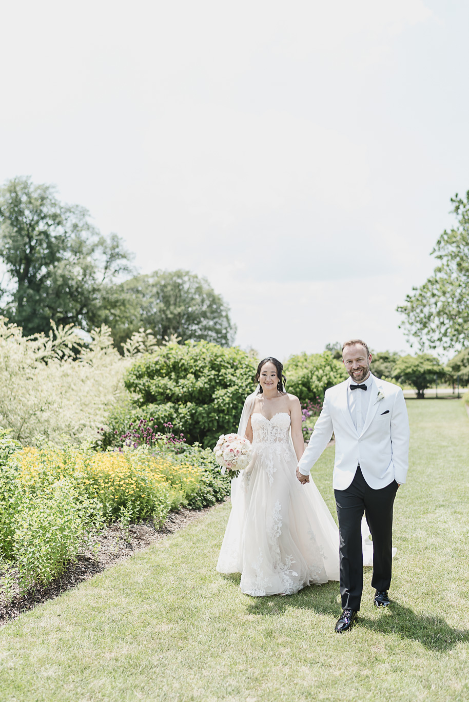 A classic black tie dusty blue and black Detroit Yacht Club wedding steeped in tradition, family heirlooms, hydrangaes, and happy tears by Kari Dawson, top rated Detroit wedding photographer, and her team. 