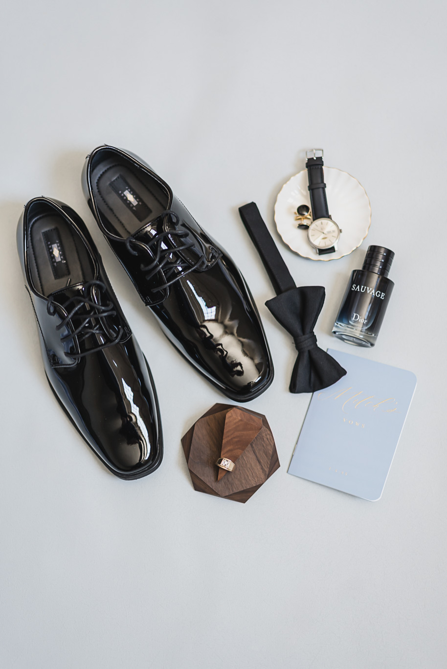 A classic black tie dusty blue and black Detroit Yacht Club wedding steeped in tradition, family heirlooms, hydrangaes, and happy tears by Kari Dawson, top rated Detroit wedding photographer, and her team. 