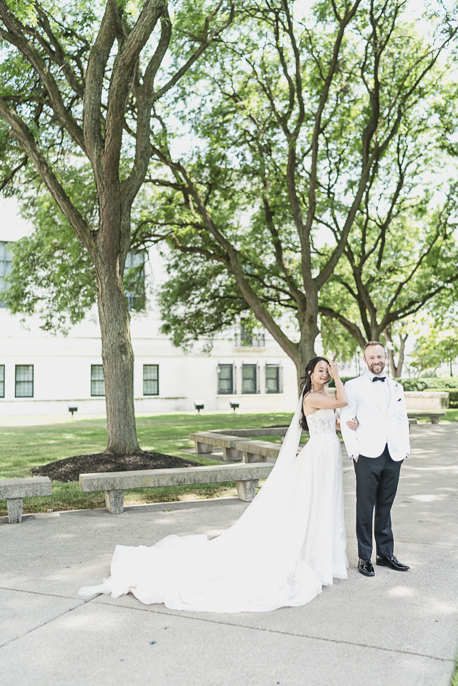 A classic black tie dusty blue and black Detroit Yacht Club wedding steeped in tradition, family heirlooms, hydrangaes, and happy tears by Kari Dawson, top rated Detroit wedding photographer, and her team. 
