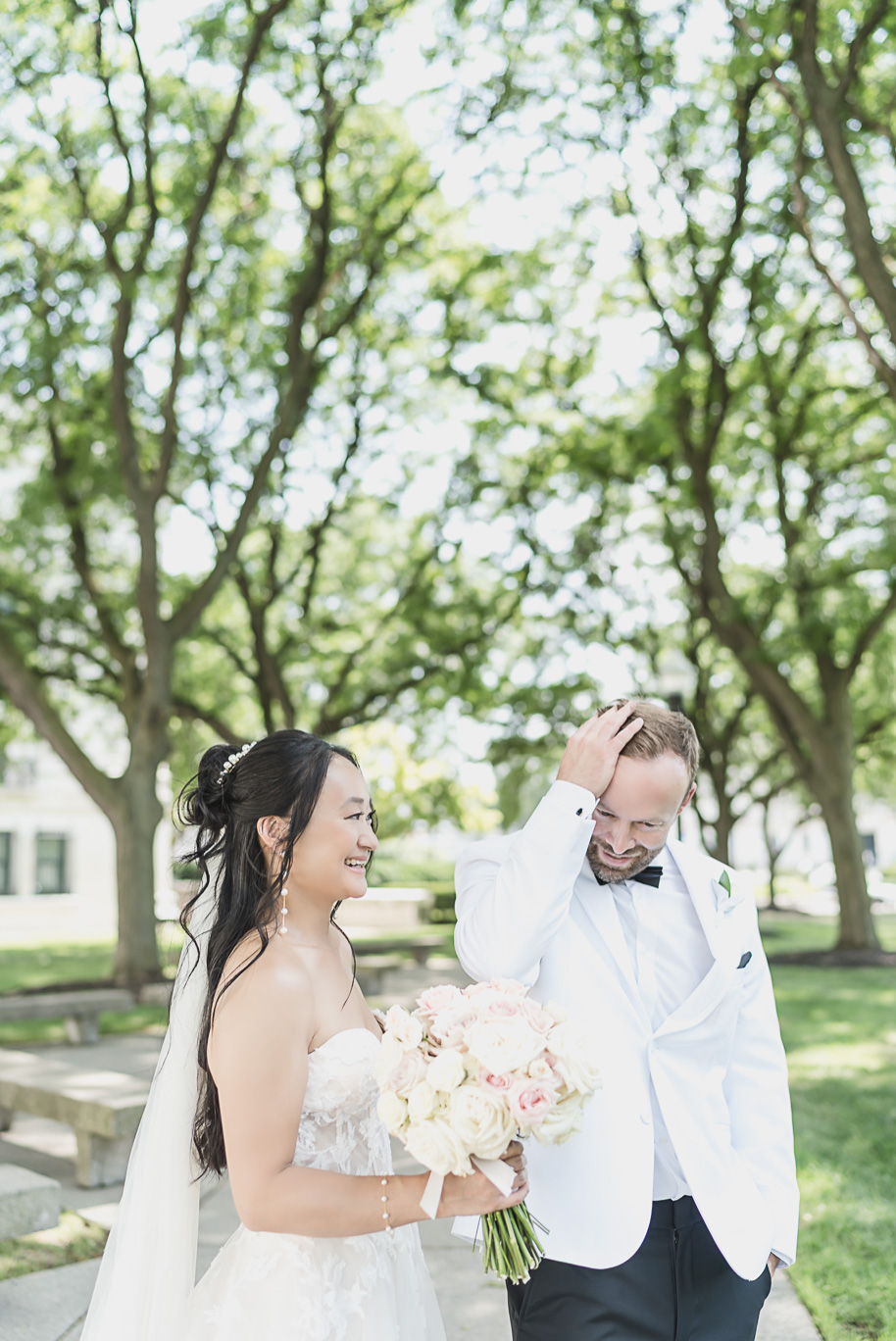A classic black tie dusty blue and black Detroit Yacht Club wedding steeped in tradition, family heirlooms, hydrangaes, and happy tears by Kari Dawson, top rated Detroit wedding photographer, and her team. 