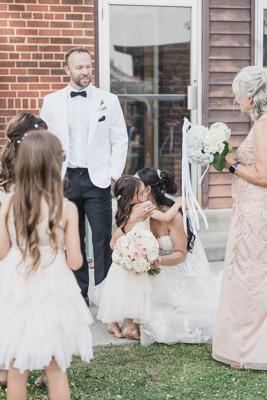 A classic black tie dusty blue and black Detroit Yacht Club wedding steeped in tradition, family heirlooms, hydrangaes, and happy tears by Kari Dawson, top rated Detroit wedding photographer, and her team. 