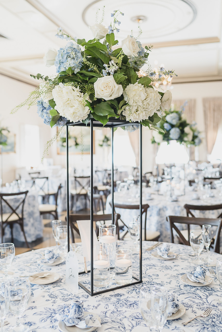 A classic black tie dusty blue and black Detroit Yacht Club wedding steeped in tradition, family heirlooms, hydrangaes, and happy tears by Kari Dawson, top rated Detroit wedding photographer, and her team. 
