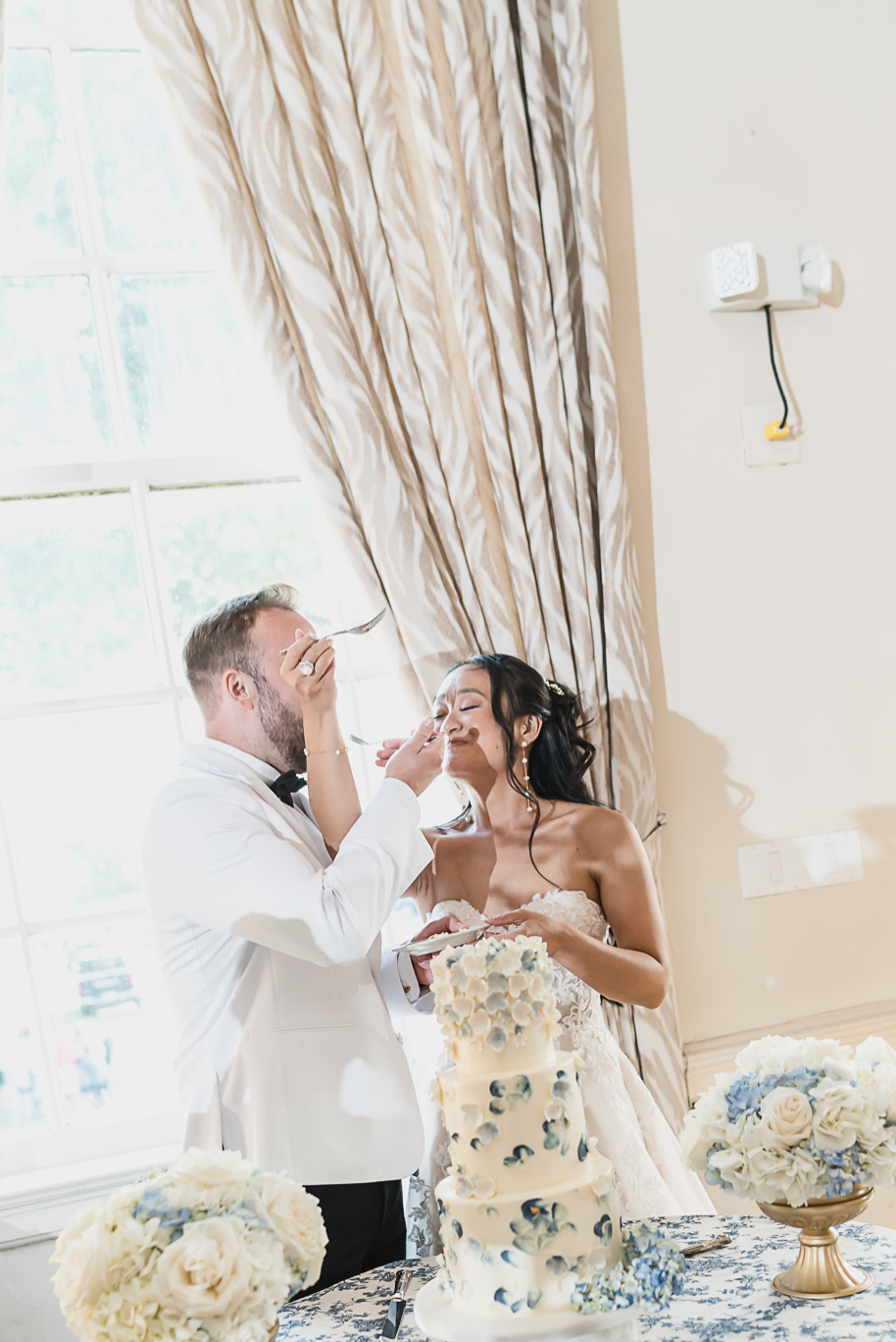 A classic black tie dusty blue and black Detroit Yacht Club wedding steeped in tradition, family heirlooms, hydrangaes, and happy tears by Kari Dawson, top rated Detroit wedding photographer, and her team. 