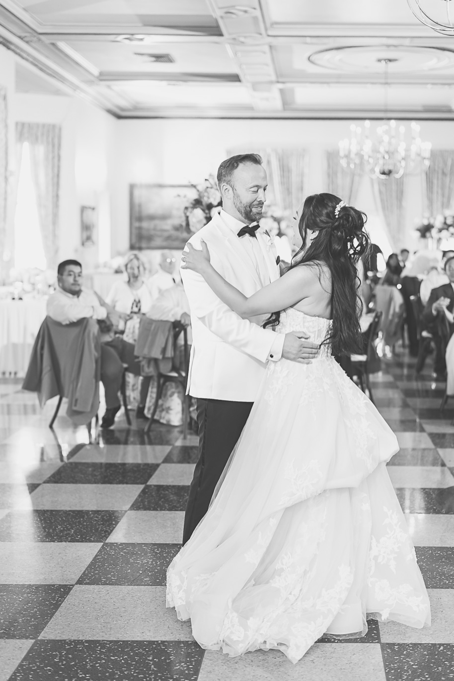 A classic black tie dusty blue and black Detroit Yacht Club wedding steeped in tradition, family heirlooms, hydrangaes, and happy tears by Kari Dawson, top rated Detroit wedding photographer, and her team. 