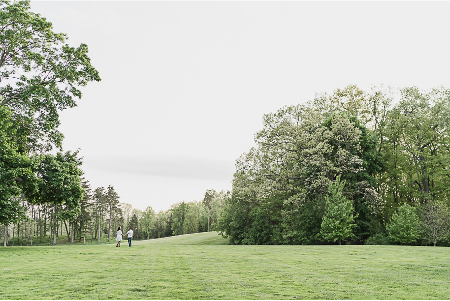 Sunlit Strolls and Timeless Love at Meadow Brook Hall; a romantic Meadow Brook Hall Engagement Session provided by top-rated Rochester wedding photographer, Kari Dawson.