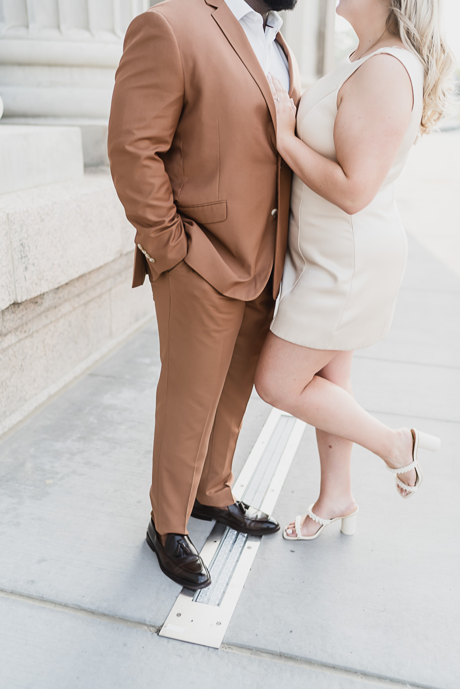 A Michigan Central Engagement full of romance and iconic style provided by Kari Dawson, top-rated Detroit wedding photographer, and her team.  