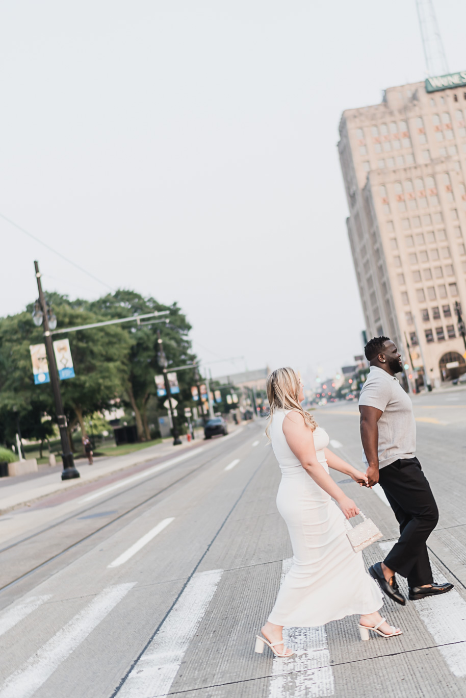 A Michigan Central Engagement full of romance and iconic style provided by Kari Dawson, top-rated Detroit wedding photographer, and her team.  