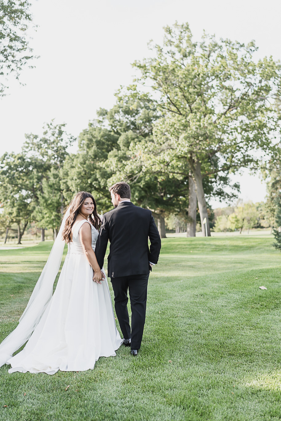A jewish Bay Pointe Golf Club wedding on Middle Straights Lake provided by top-rated Detroit wedding photographer Kari Dawson + Co.