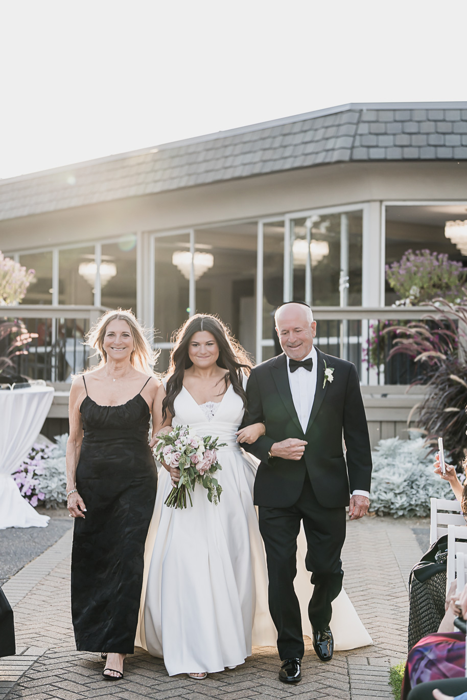A jewish Bay Pointe Golf Club wedding on Middle Straights Lake provided by top-rated Detroit wedding photographer Kari Dawson + Co.