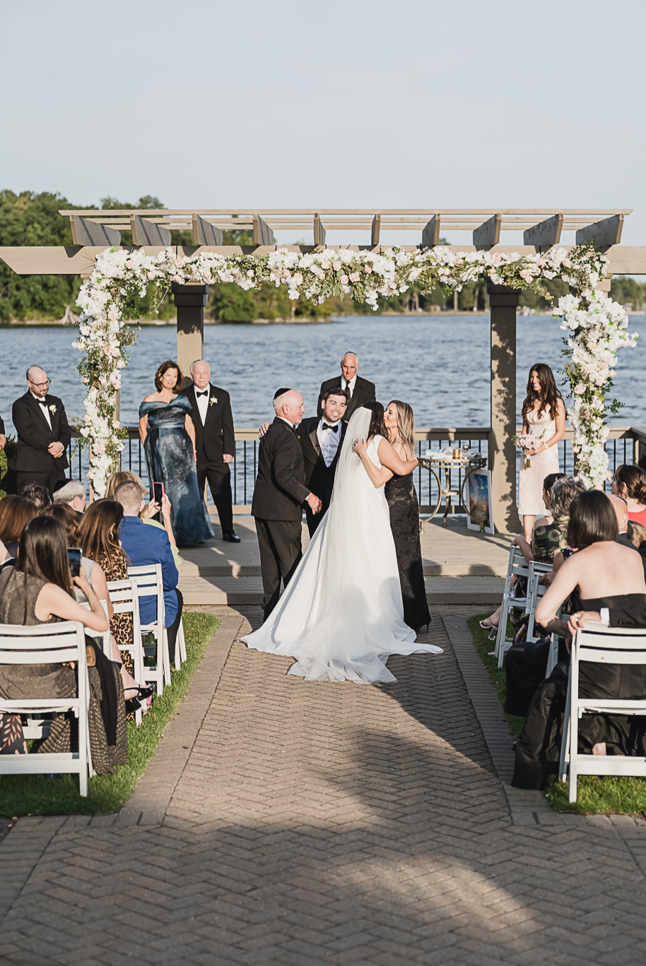 A jewish Bay Pointe Golf Club wedding on Middle Straights Lake provided by top-rated Detroit wedding photographer Kari Dawson + Co.