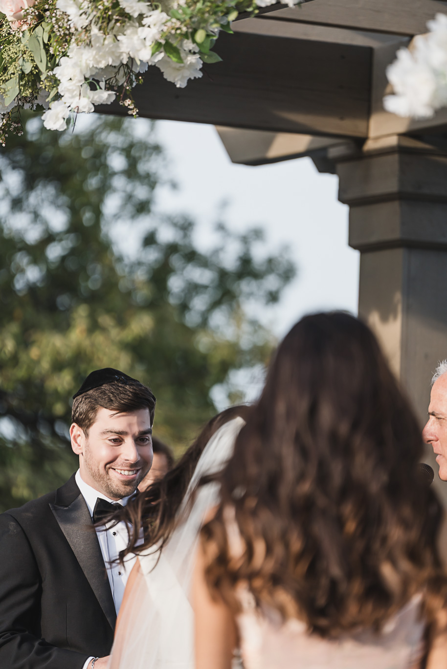 A jewish Bay Pointe Golf Club wedding on Middle Straights Lake provided by top-rated Detroit wedding photographer Kari Dawson + Co.