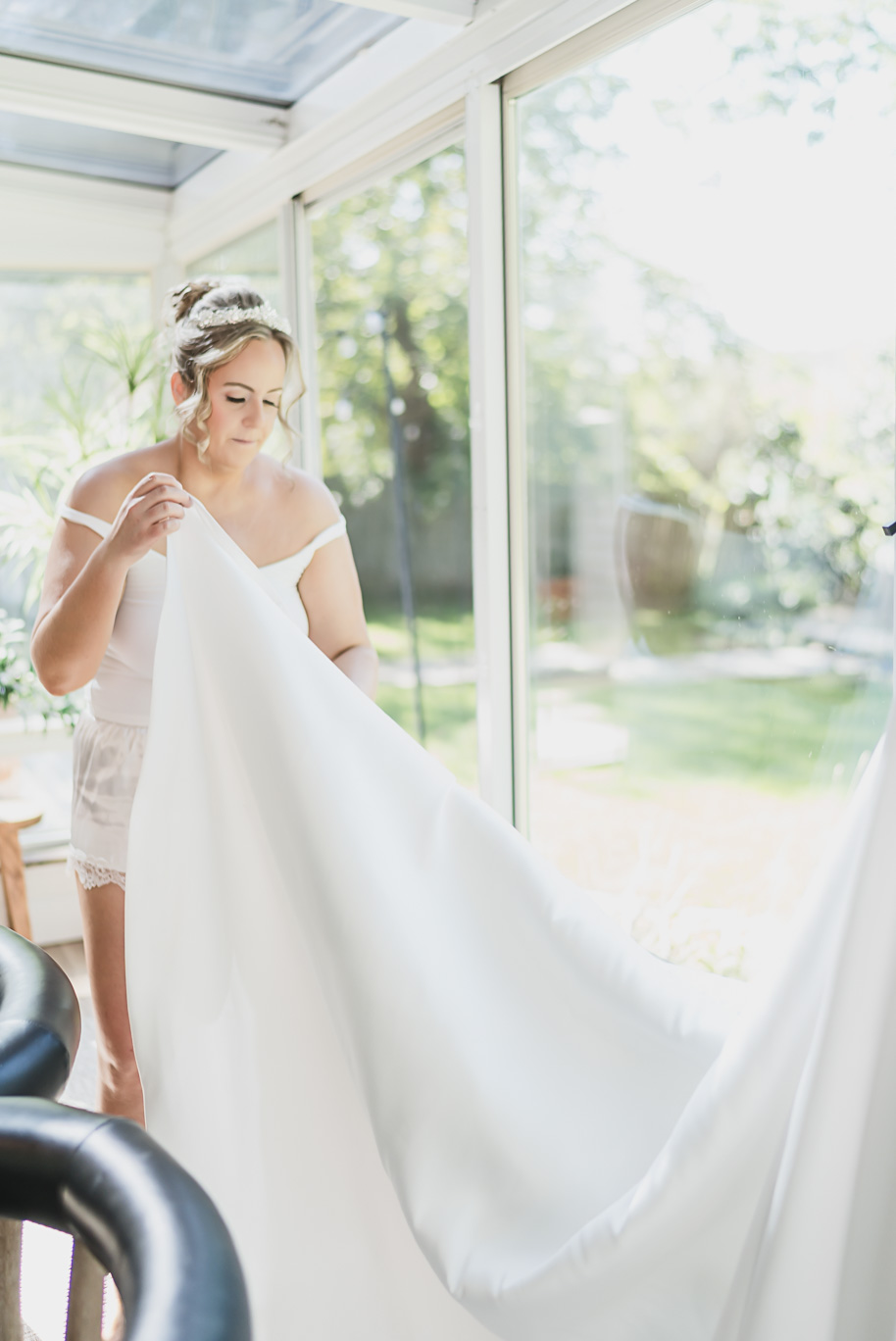 An emerald and gold fall interracial Castle Farms wedding in Charlevoix Northern Michigan by top-rated Northern Michigan wedding photography team Kari Dawson + Co.